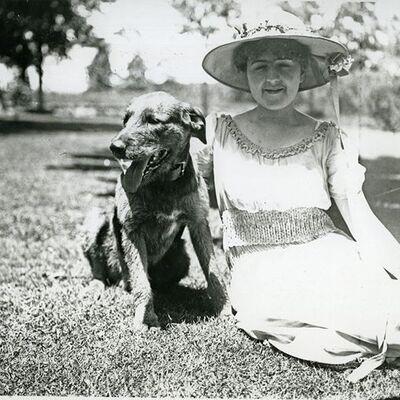 old photo of a lady and her dog